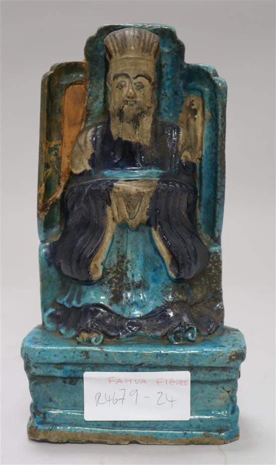A Chinese Fahua-decorated seated figure of an emperor, Ming dynasty, 8in. (22.5cm), repairs